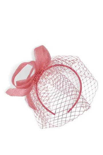 Pink Swirl Sinamay fascinator with Mesh