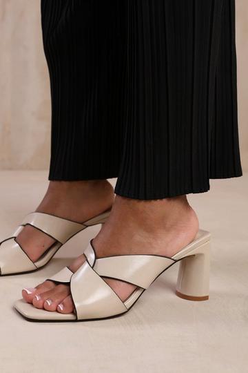 'Kenya' Twist Over Strap Block Heel Mules Beige