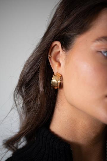 Chunky hoop earrings in gold with inprinted texture Gold