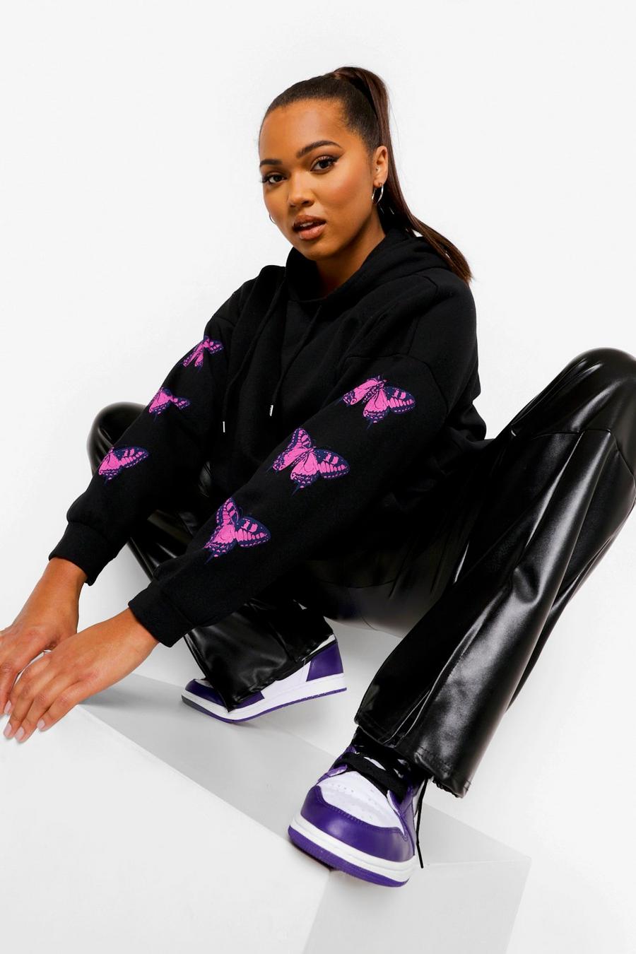 Plus - Oversize hoodie med fjärilar längs ärmen image number 1