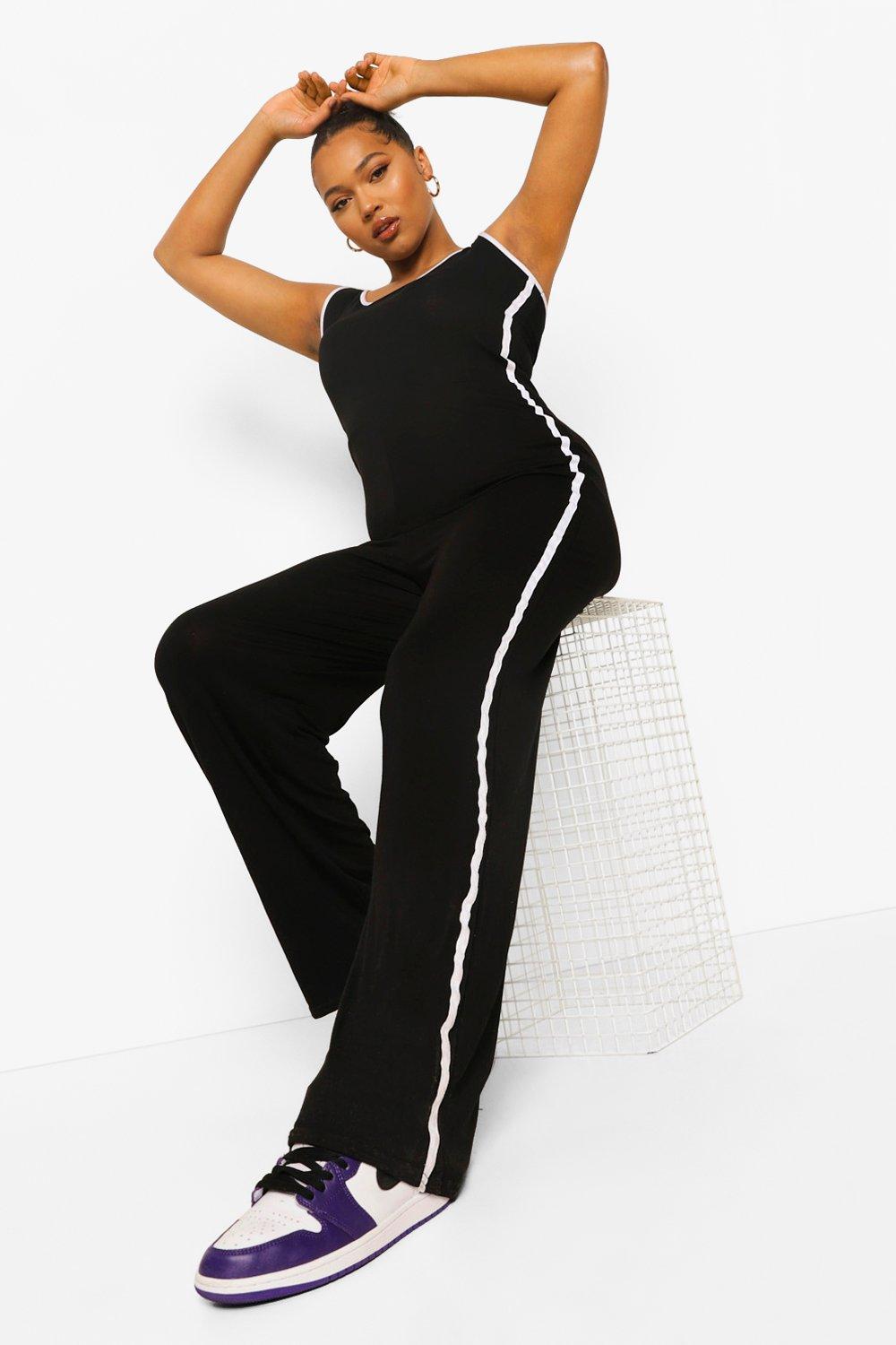 ASOS DESIGN jersey overalls in black with side stripe