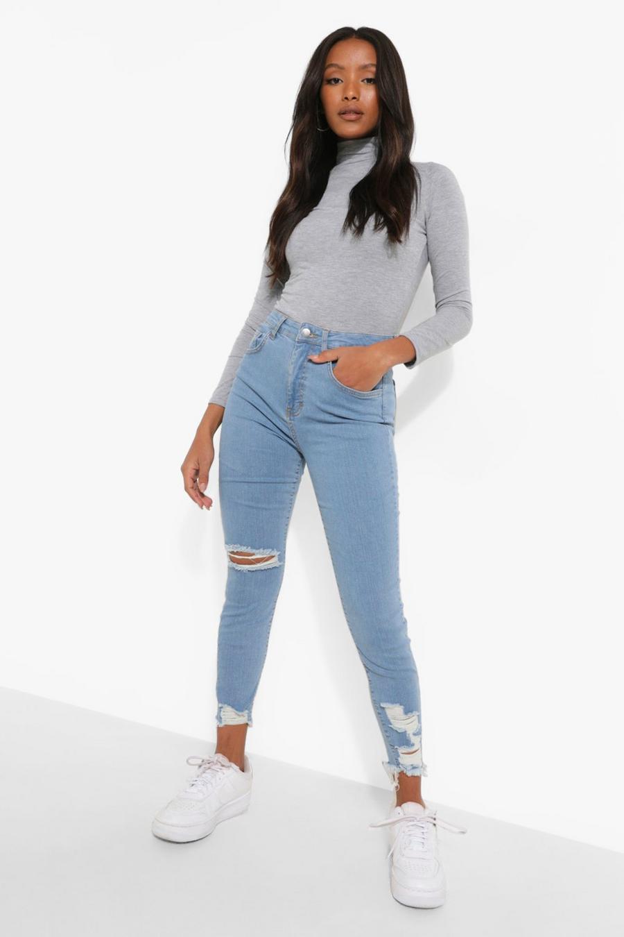 Light wash Petite Distressed Stretch Skinny Jeans image number 1