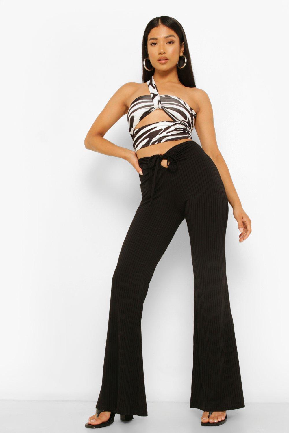 Pantalon large troué hot sale