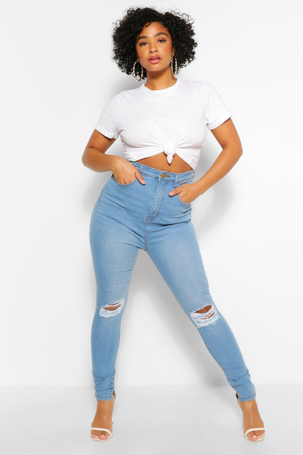 blue ripped knee skinny jeans