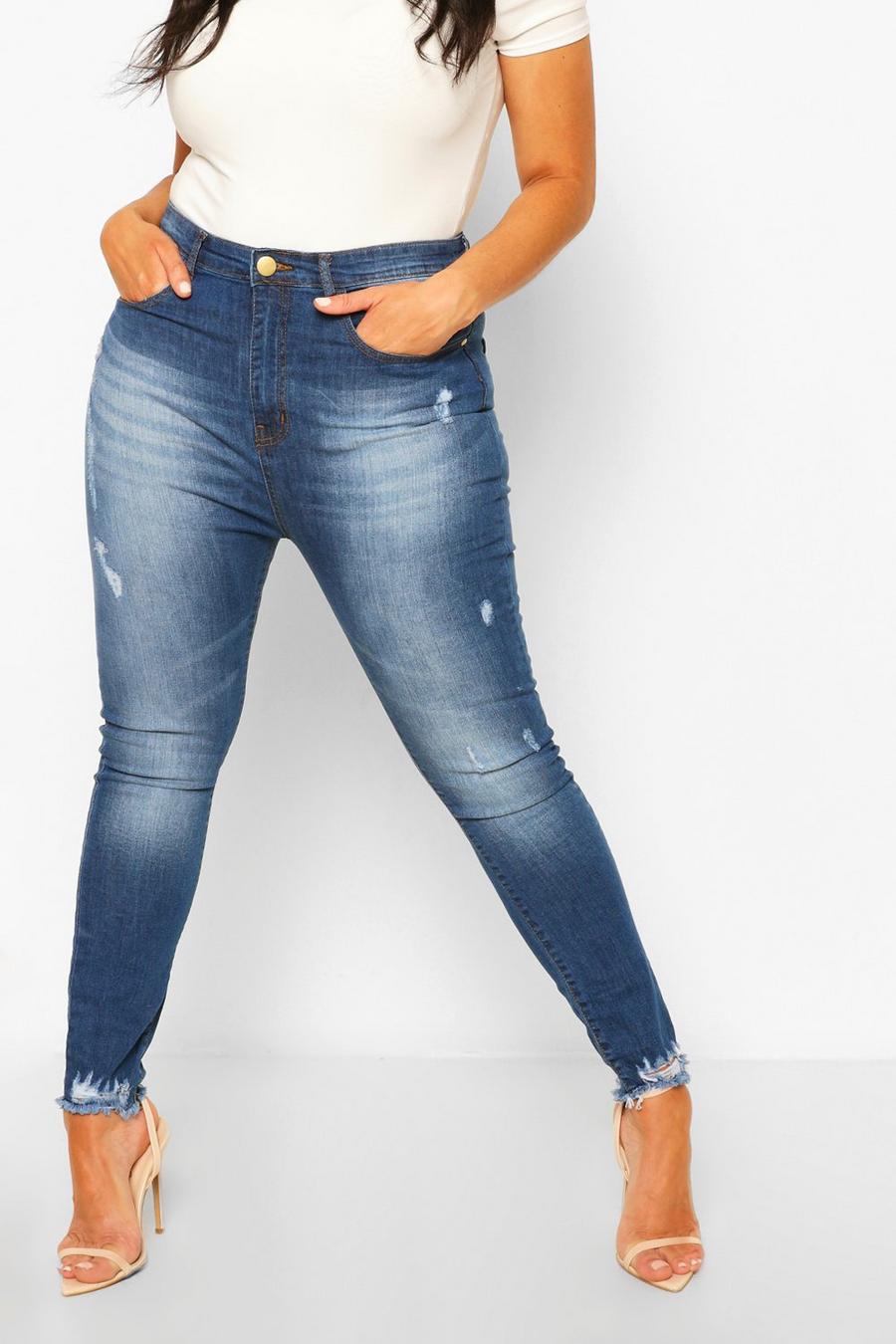 Mid blue Plus - Skinny jeans med mycket slitna detaljer och rå kant image number 1