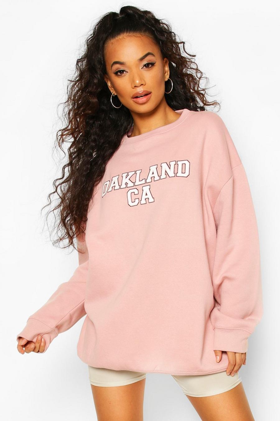 Petite Pullover in Übergröße mit „Oakland“-Slogan, Rosa image number 1