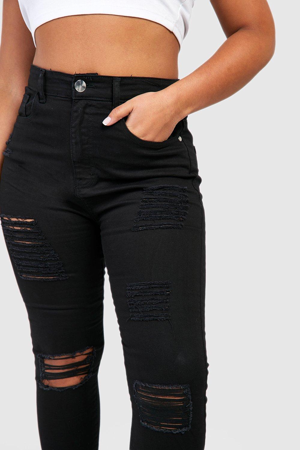 Ripped high waisted hot sale black skinny jeans