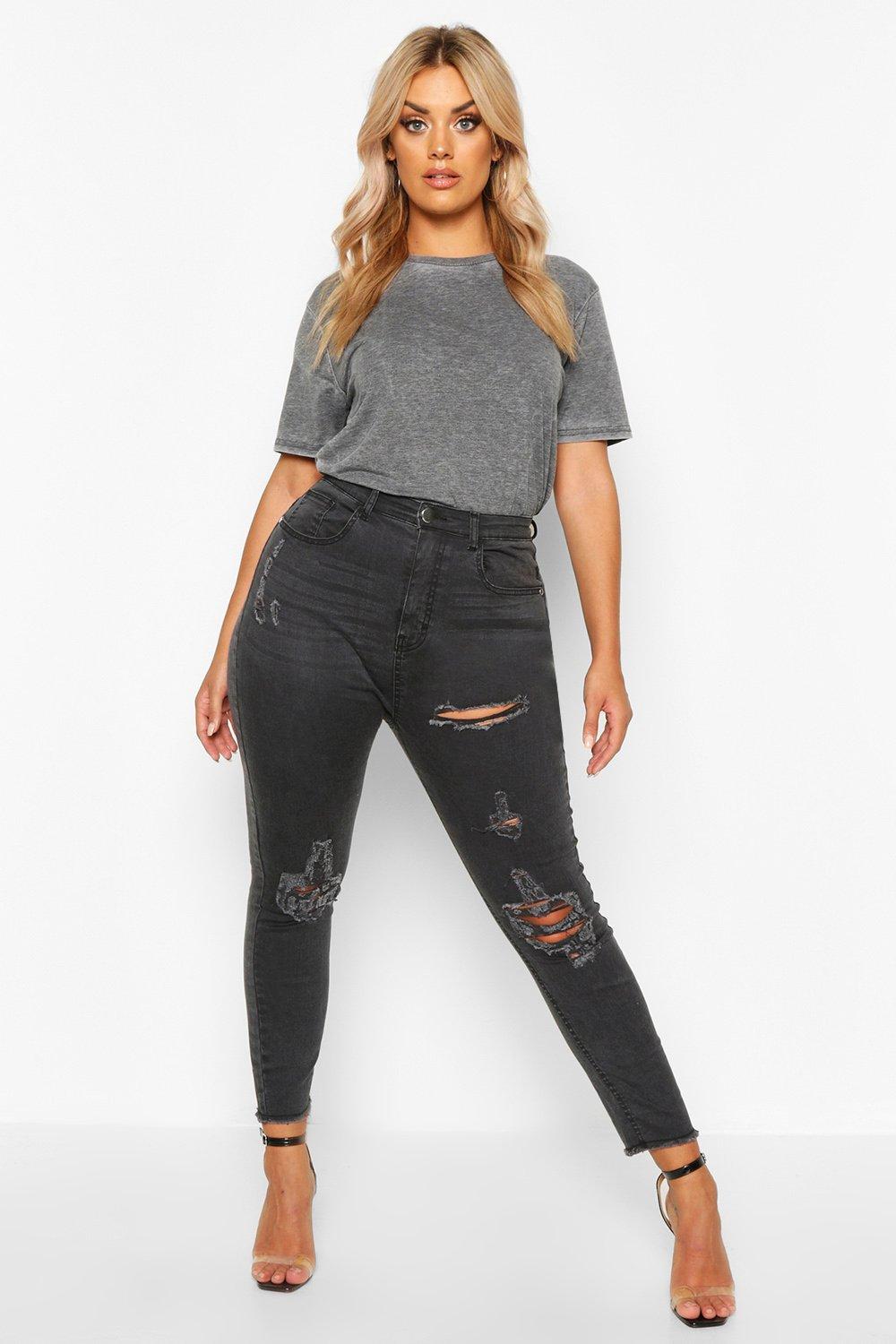 super distressed black skinny jeans