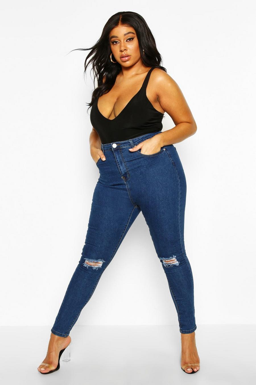 שפשוף בינוני טייץ ג'ינס סקיני עם קרע בברך מידות גדולות image number 1
