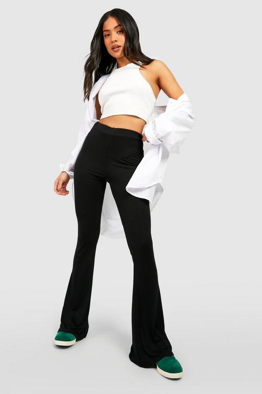 Flared jersey Milano rib pants in Black for