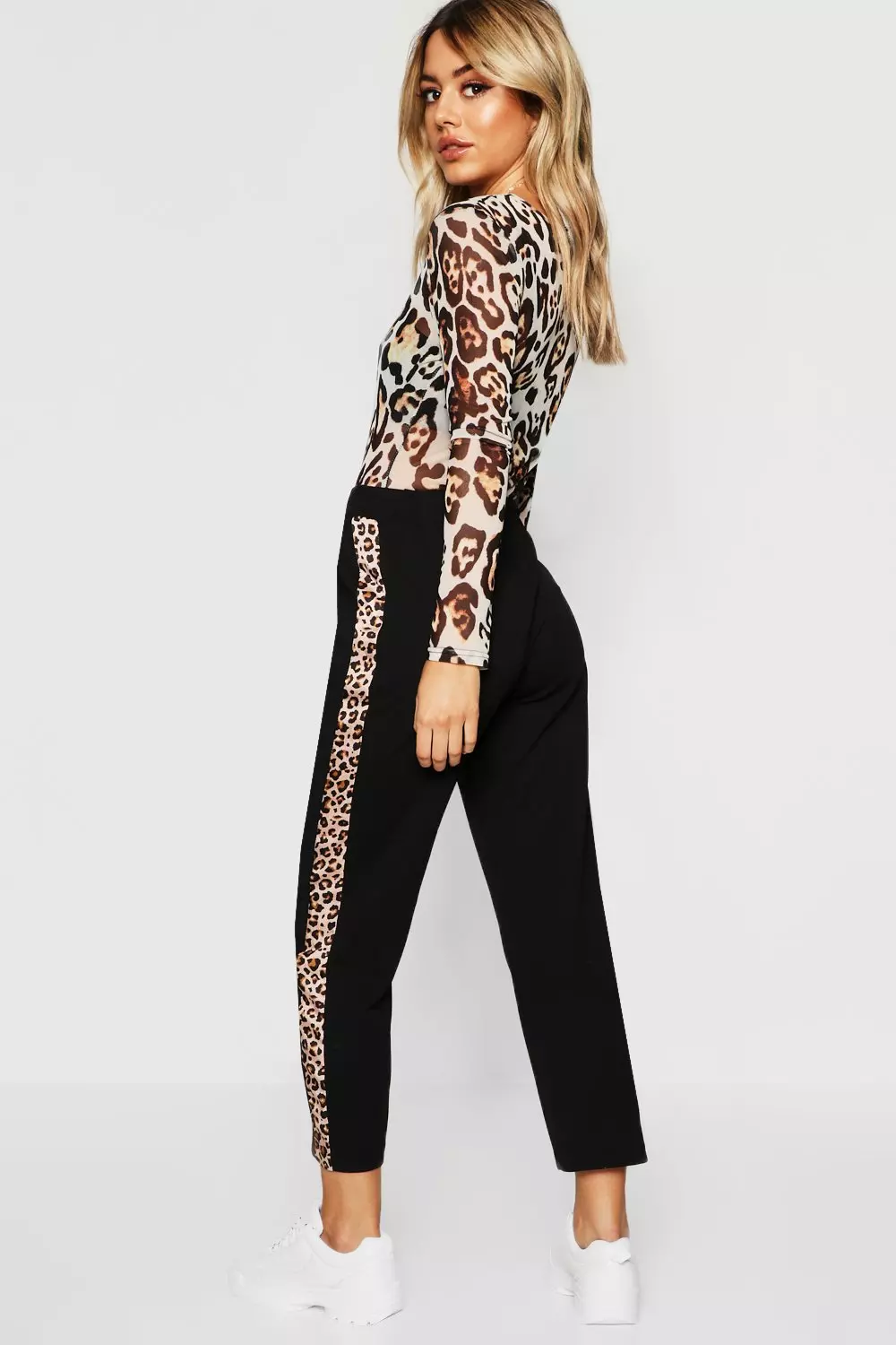 Black trousers with store leopard print stripe