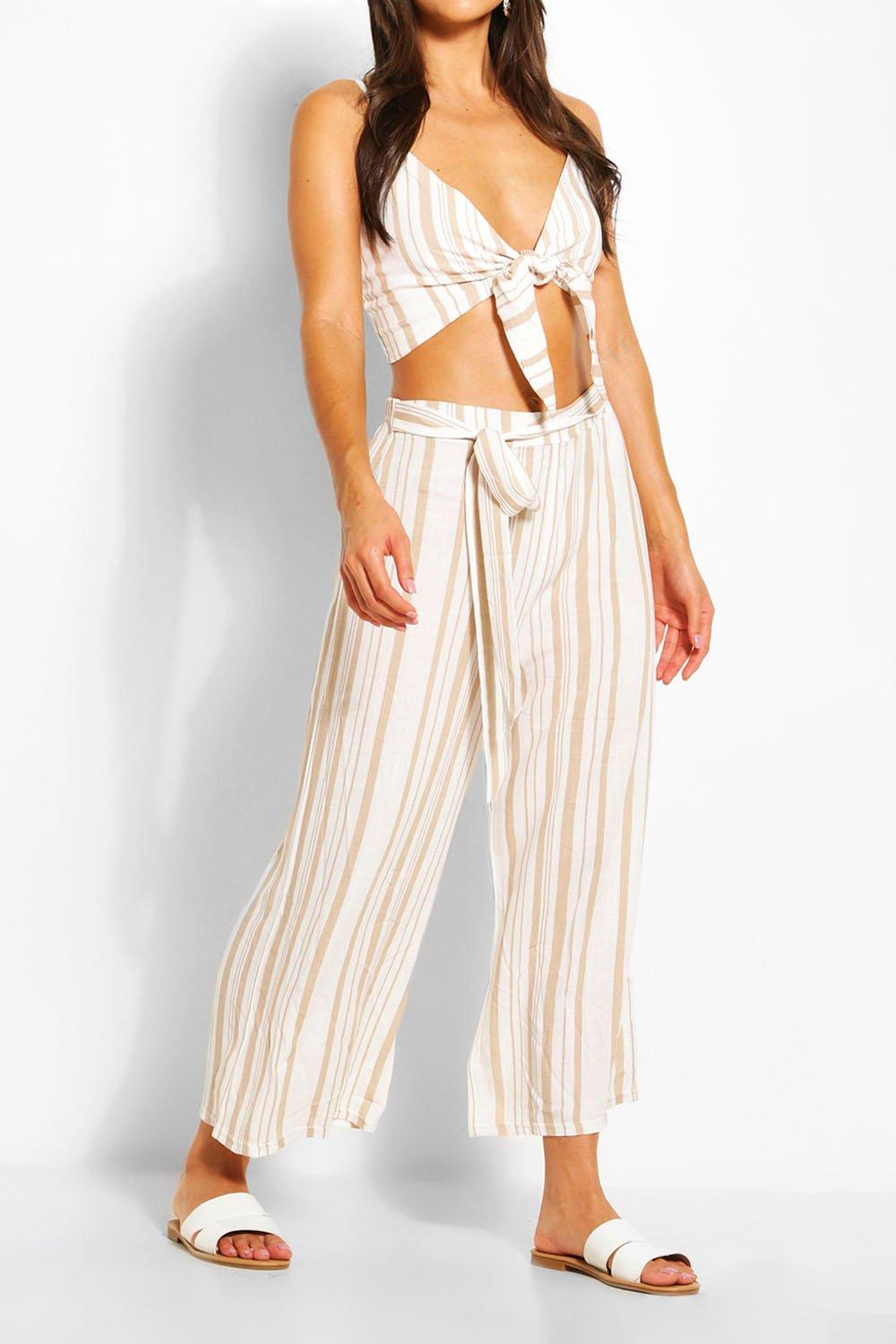 Pantalones playeros de efecto lino con nudo en la cintura y en varios boohoo