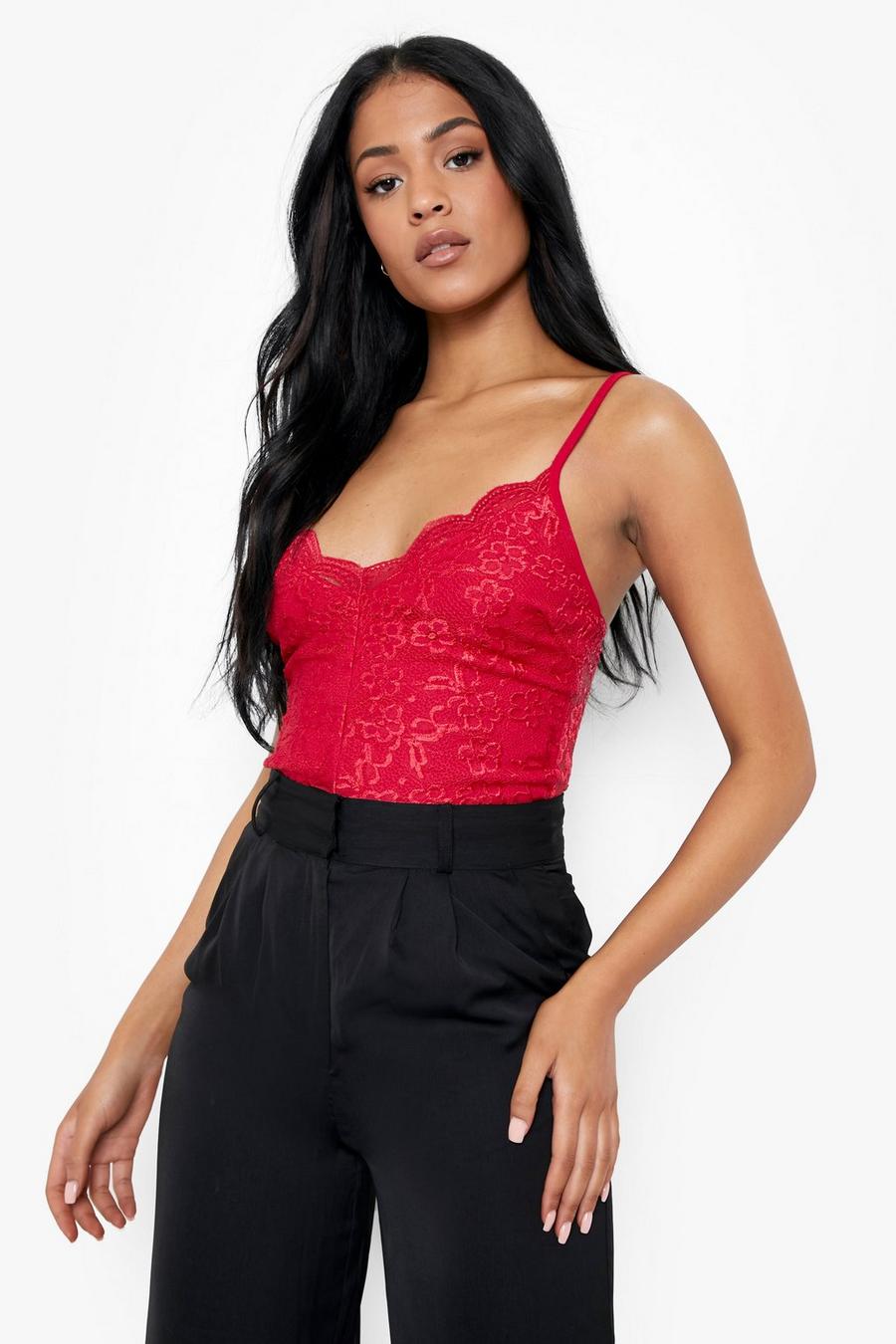 Red lace bodysuit and black jeans