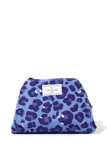 The Flat Lay Co. Drawstring Makeup Bag in Blue Leopard multi