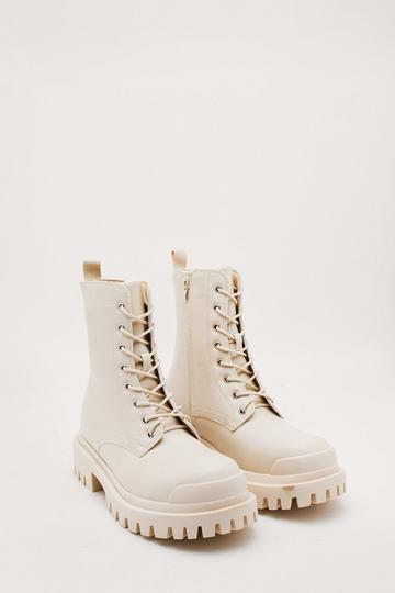 Ecru White Faux Leather Cleated Biker Boots