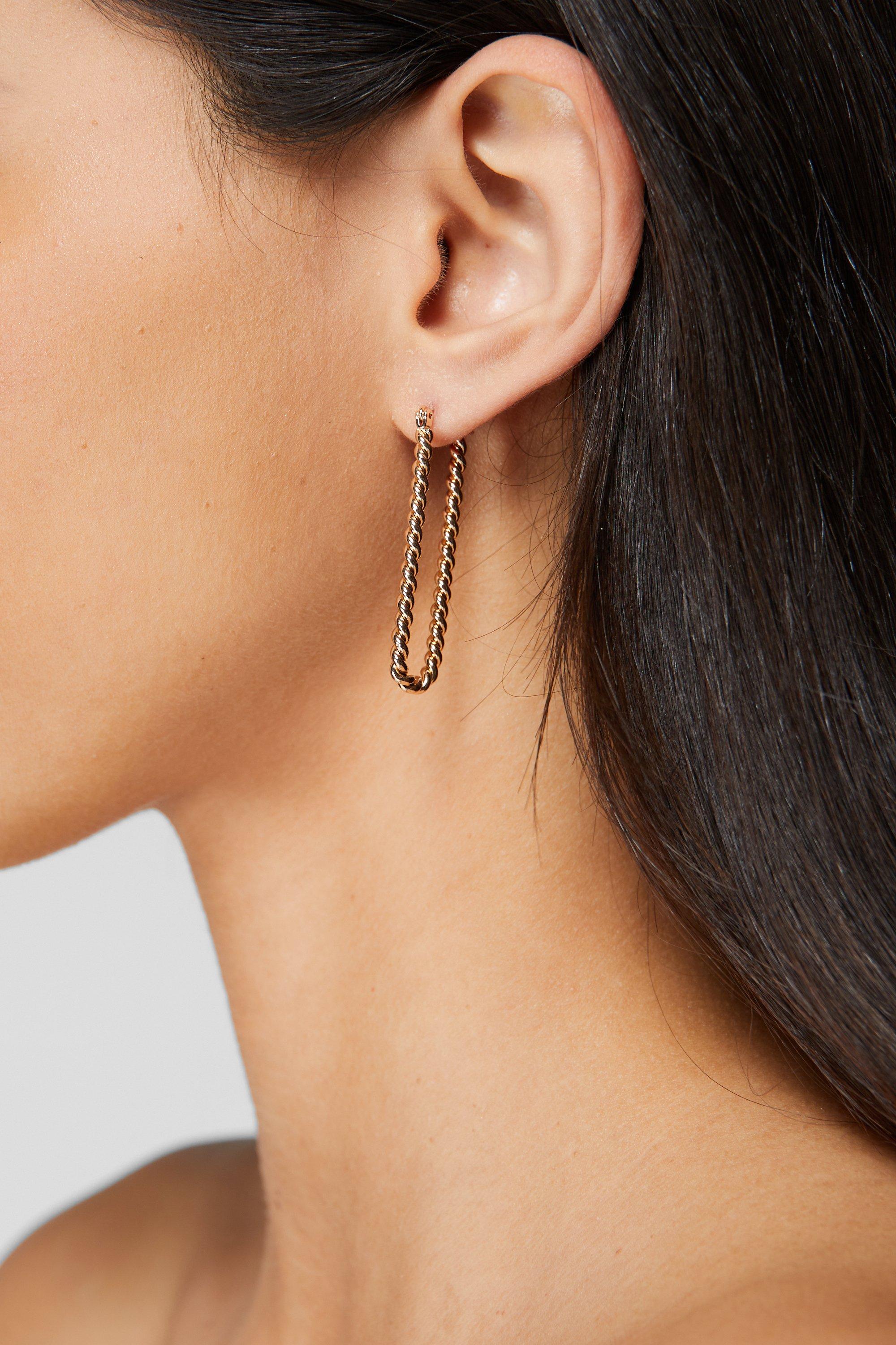 Middle finger hot sale earrings gold