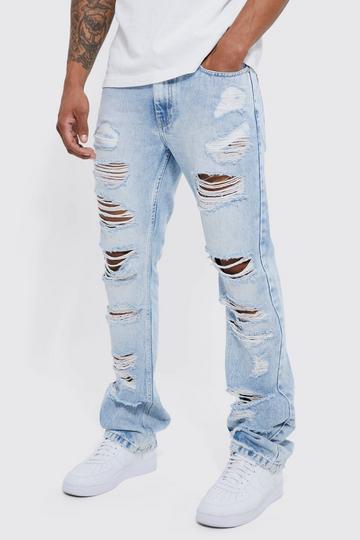 Blue Slim Flare Jeans With All Over Rips