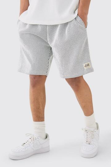 White Relaxed Mid Length Textured Short With Woven Tab