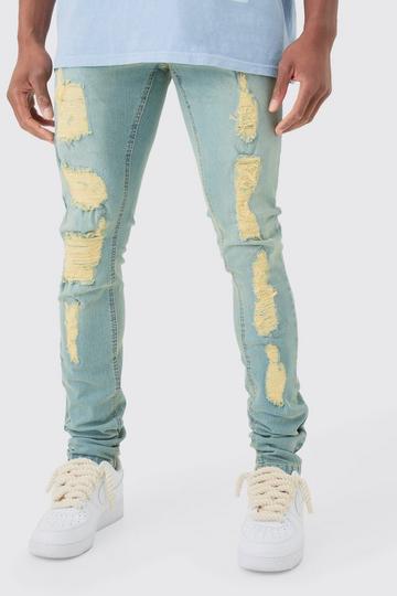 Skinny Stacked Distressed Ripped Jeans In Antique Blue antique blue
