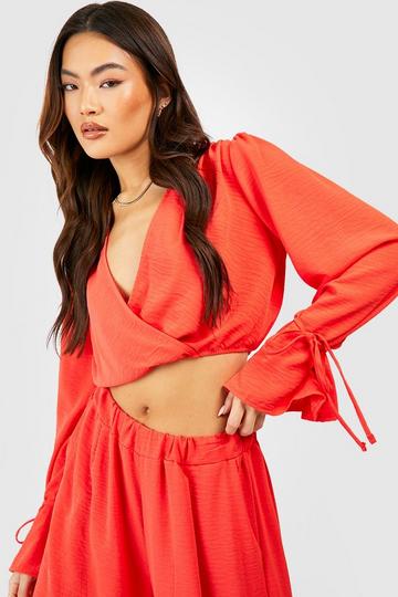 Red Hammered Tie Cuff Wrap Front Blouse