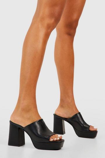 Platform Heeled Mules black