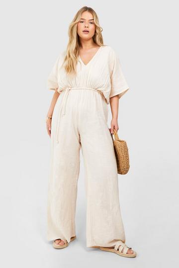 Plus Textured Plunge Belted Jumpsuit stone